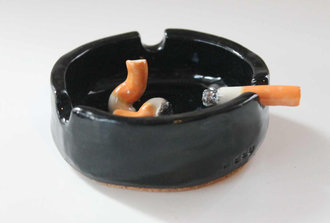 ciggy-butt ashtray jewellery dish